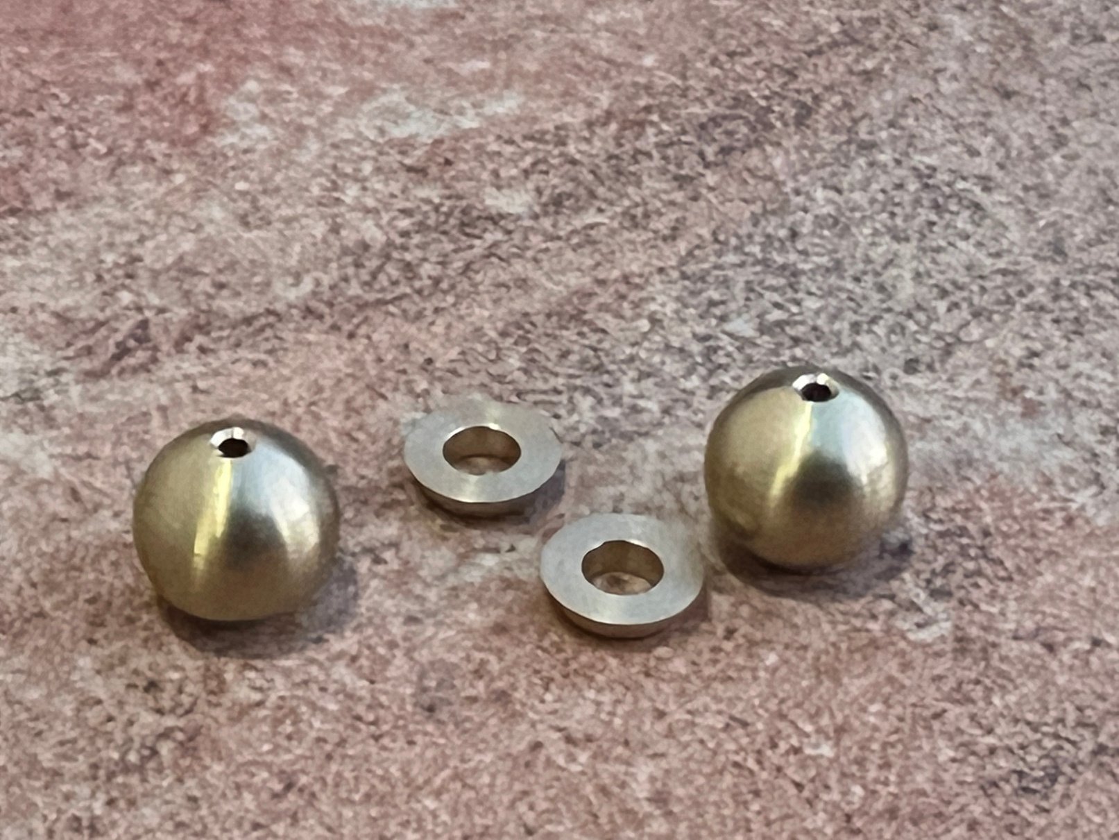 Machined spherical component